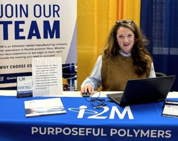 i2M team member at job fair